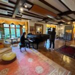 Curtis Schwartz Studio live room with a grand piano and acoustic ceiling treatment